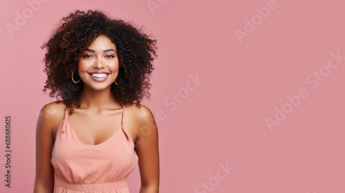 Afro-american woman model wearing a pink sundress isolated on pastel