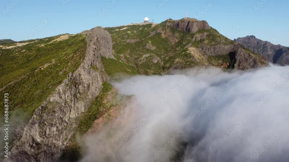 Aerial drone view over the foggy mist on the mountain tops of Madeira Aerial drone view over the foggy mist on the mountain tops of Madeira