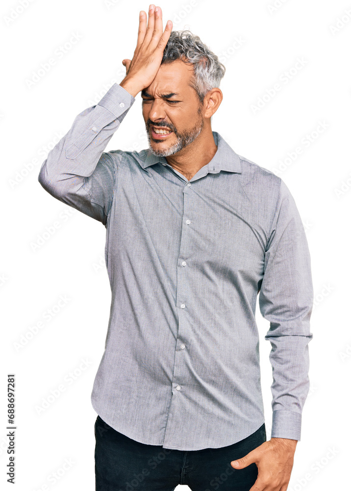Middle age grey-haired man wearing casual clothes surprised with hand on head for mistake, remember error. forgot, bad memory concept. Middle age grey-haired man wearing casual clothes surprised with hand on head for mistake, remember error. forgot, bad memory concept.