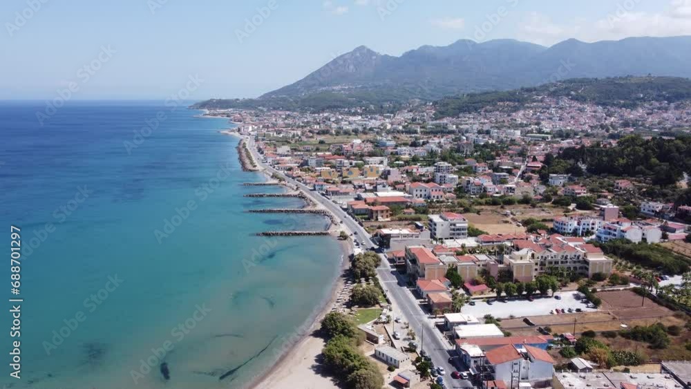 Aerial top view of Karlovasi in Samos with the green landscape of the Aegean island Aerial top view of Karlovasi in Samos with the green landscape of the Aegean island