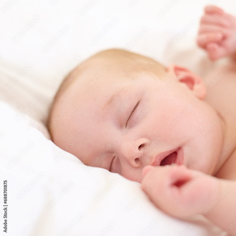 Baby, sleeping and bed in home, closeup and nursery with growth, development and wellness in room. Infant, child and newborn with rest, tired or dream in bedroom for health in family house with peace Baby, sleeping and bed in home, closeup and nursery with growth, development and wellness in room. Infant, child and newborn with rest, tired or dream in bedroom for health in family house with peace