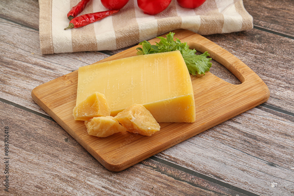 Parmesan hard cheese with small pieces Parmesan hard cheese with small pieces
