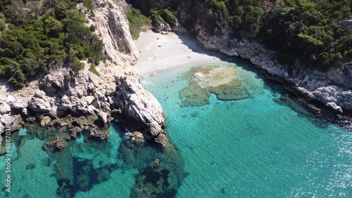 Aerial top view footage of crystal clear water beach of Seitani in the Aegean island Samos photo