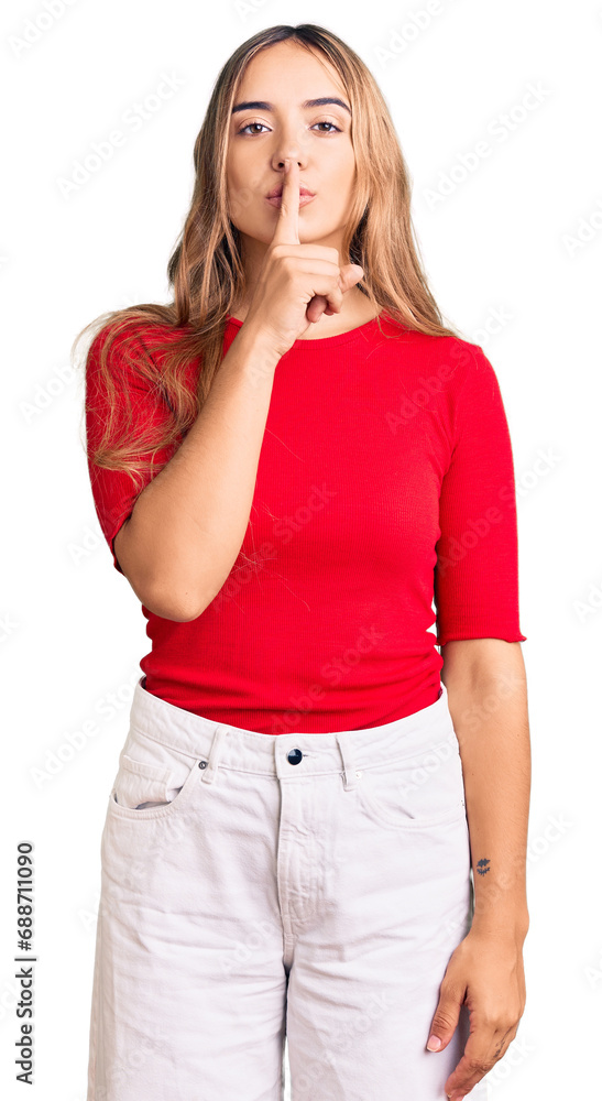 Young beautiful blonde woman wearing casual clothes asking to be quiet with finger on lips. silence and secret concept. Young beautiful blonde woman wearing casual clothes asking to be quiet with finger on lips. silence and secret concept.