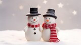  a couple of snowmen standing next to each other in front of a snowman on top of a snowman.
