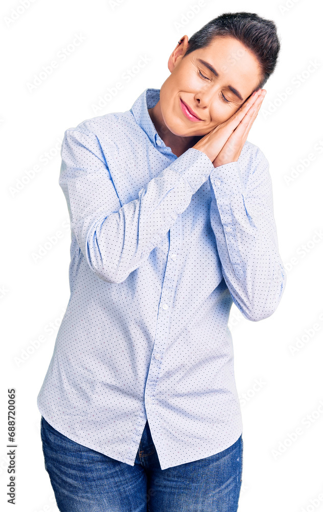 Young woman with short hair wearing business clothes sleeping tired dreaming and posing with hands together while smiling with closed eyes. Young woman with short hair wearing business clothes sleeping tired dreaming and posing with hands together while smiling with closed eyes.