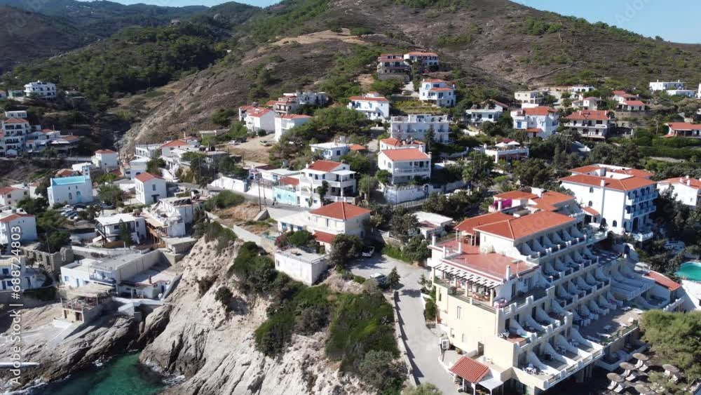 Aerial drone view of Armenistis fisher town in Ikaria. Classical Greek town of the Aegean Islands Aerial drone view of Armenistis fisher town in Ikaria. Classical Greek town of the Aegean Islands