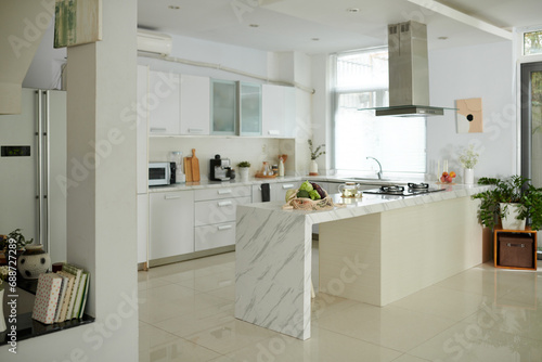 Fototapeta Naklejka Na Ścianę i Meble -  Interior design of spacious kitchen area in house