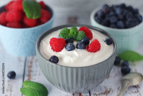 A bowl with Greek yogurt with berries