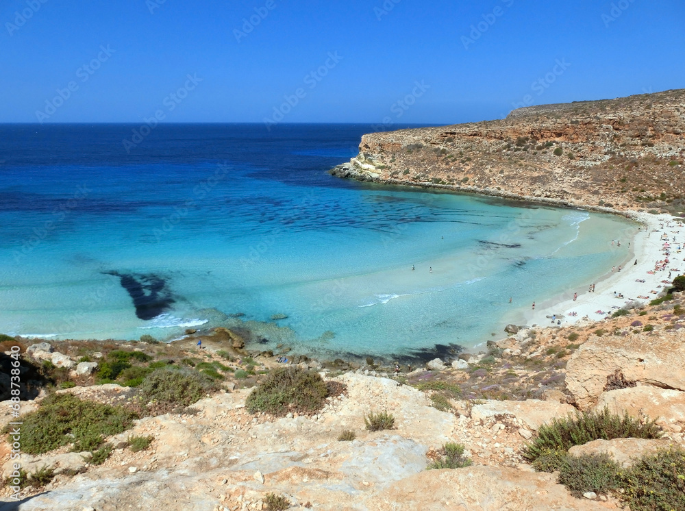 Coast with sea of Lampedusa Island in Southern Italy in the Mediterranean Sea