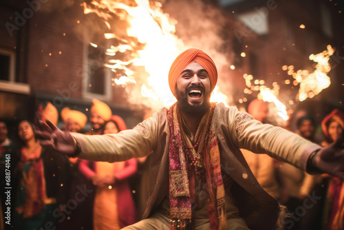 Punjabi religious people performing bhangra dance, celebrating lohri festival photo