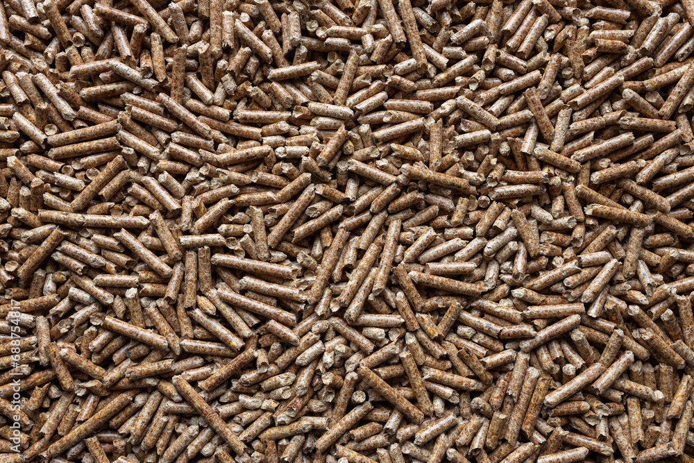 Wooden pellets. Ecologic fuel made from biomass. Renewable energy source. Top view. Wooden pellets. Ecologic fuel made from biomass. Renewable energy source. Top view.