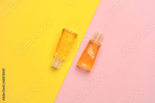 Antiseptic bottles on a colored background