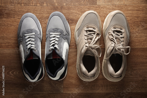 Two pair of running sneakers on the floor