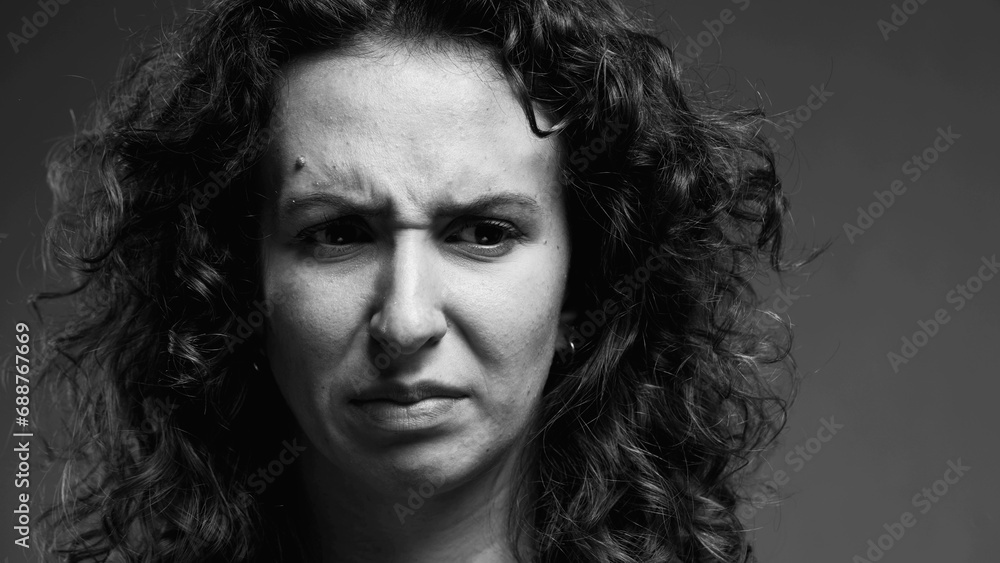 Αυτοκόλλητο Female Expressing Extreme Aversion, Disgusted Reaction Portrait in black and whi