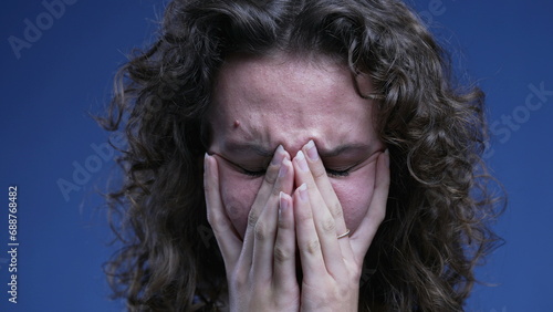 Wallpaper Mural Frustrated young woman covering face with hands feeling regret and anxiety, close-up face of female person in 20s having shame about past memories Torontodigital.ca