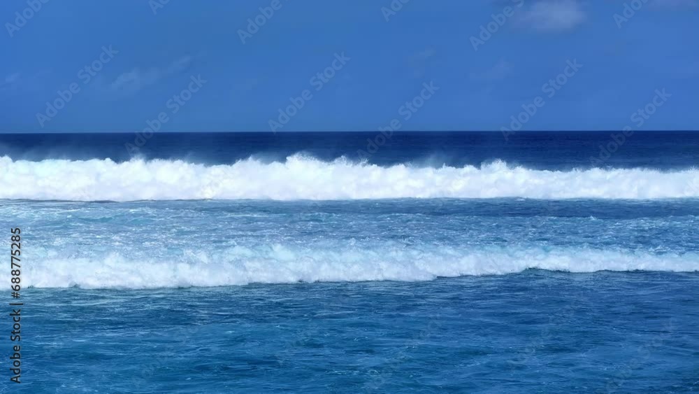 Aerial: Drone Lockdown Shot Of Waves Splashing In Blue Sea On Sunny Day - Hithadhoo, Maldives Aerial: Drone Lockdown Shot Of Waves Splashing In Blue Sea On Sunny Day - Hithadhoo, Maldives