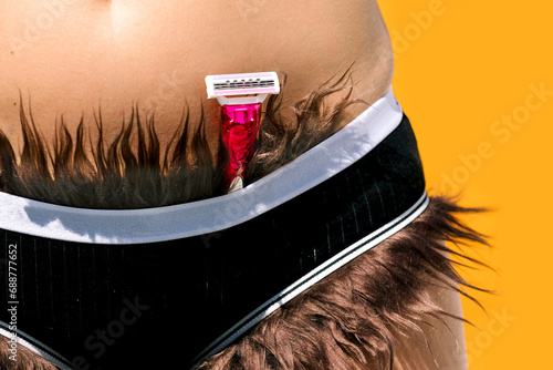 Woman with razor and pubic hair sticking out from panties photo