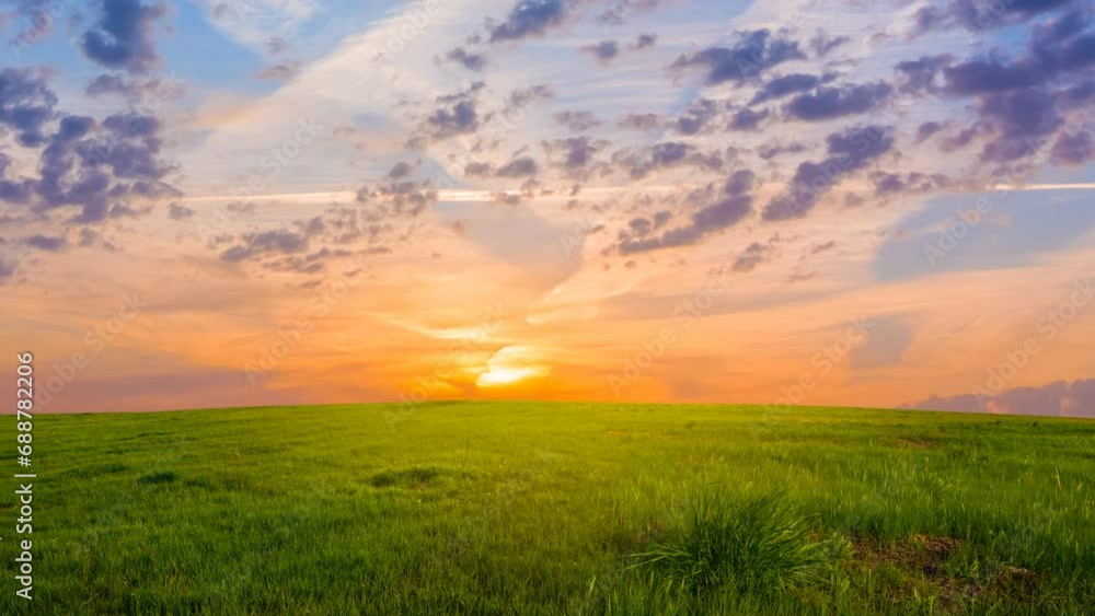 wide green rural field at the dramatic sunset, countryside agricultural time lapse scene wide green rural field at the dramatic sunset, countryside agricultural time lapse scene