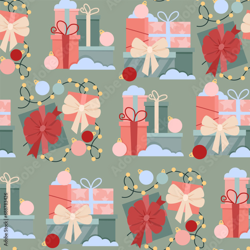 Christmas seamless pattern of gift boxes and garlands on a green background
