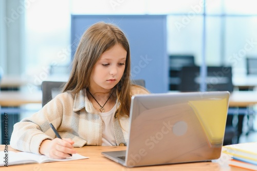 Wow, Online School. Happy Schoolgirl At Laptop Learning. Online Lesson And Educational Offer Posing At Home