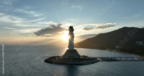 Guanyin statue at seaside in nanshan temple, hainan island , China. photo