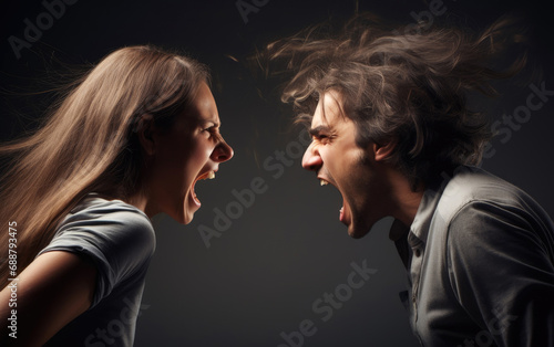 A man and a woman yelling at each other photo