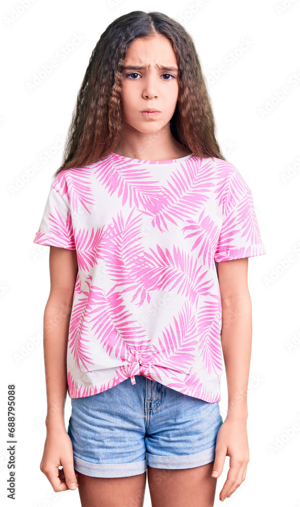 Obraz premium Cute hispanic child girl wearing casual clothes skeptic and nervous, frowning upset because of problem. negative person.