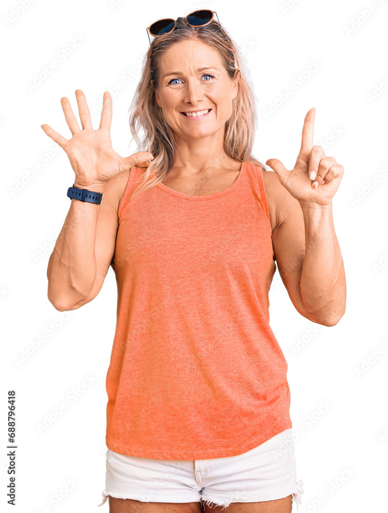 Middle age fit blonde woman wearing casual summer clothes and sunglasses showing and pointing up with fingers number seven while smiling confident and happy. Middle age fit blonde woman wearing casual summer clothes and sunglasses showing and pointing up with fingers number seven while smiling confident and happy.
