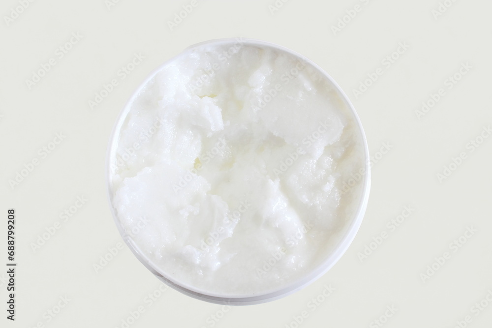 organic coconut cream oil in jar in white background,top view organic coconut cream oil in jar in white background,top view
