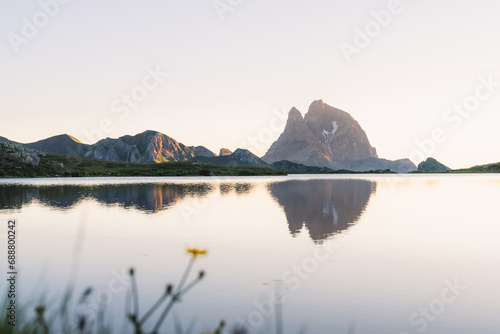 Pic du Midi d'Ossau and its reflection on the Lake of Anayet at sunrise