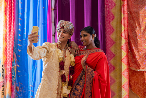 handsome indian couple making selfie, valentine's day