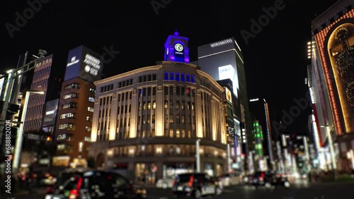GINZA, TOKYO, JAPAN - NOV 2023 : View of Ginza area at night. Famous upmarket shopping, dining and entertainment district, featuring numerous department stores, restaurants, night clubs and cafes.