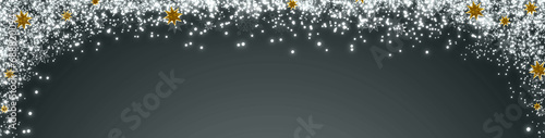 Christmas background with blurred lights and silver stars isolated on gray.