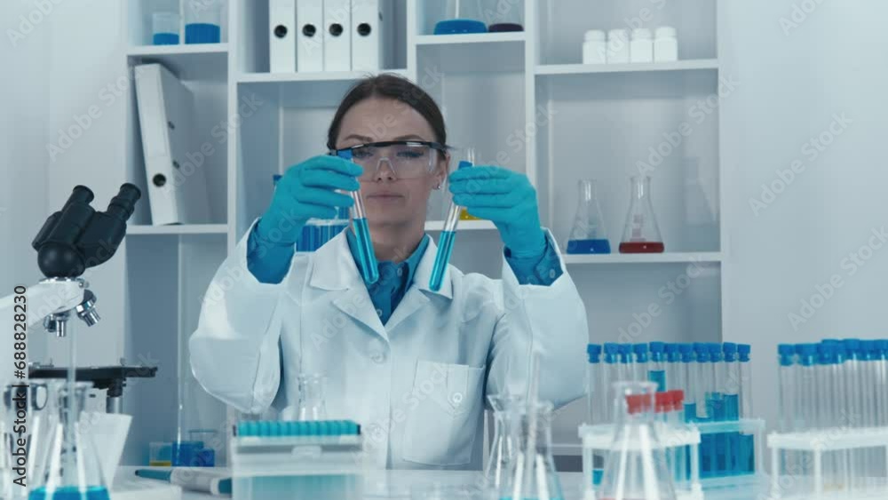 In the laboratory, the scientist conducts experiments with samples, investigating their characteristics and potential properties for the development of new medical technologies. In the laboratory, the scientist conducts experiments with samples, investigating their characteristics and potential properties for the development of new medical technologies.