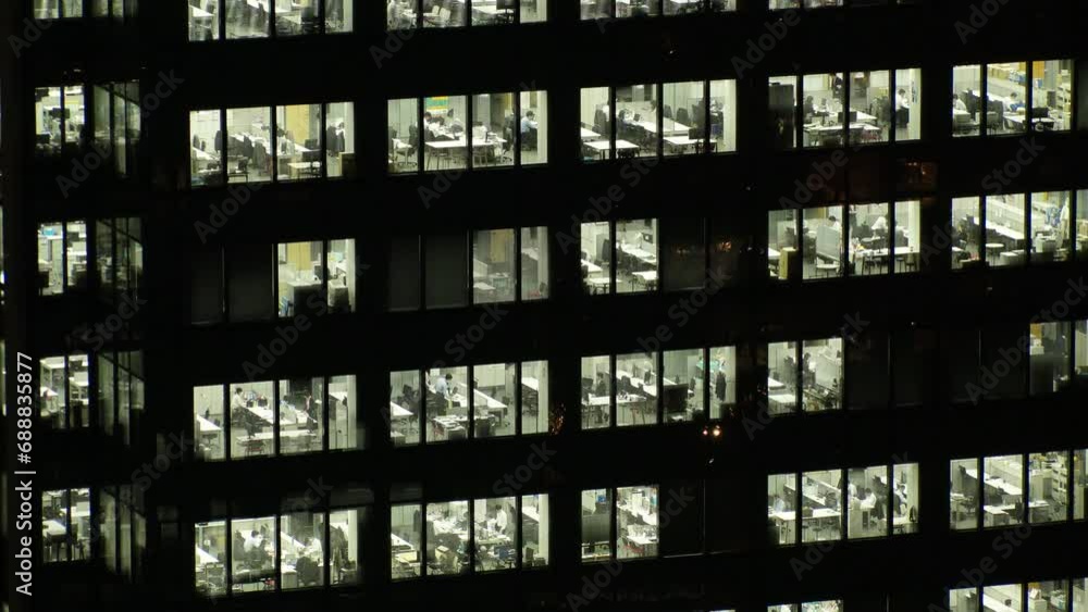 TOKYO, JAPAN : Close up shot of exterior of office building window at night. Company, corporate, job, work and business people concept video. TOKYO, JAPAN : Close up shot of exterior of office building window at night. Company, corporate, job, work and business people concept video.