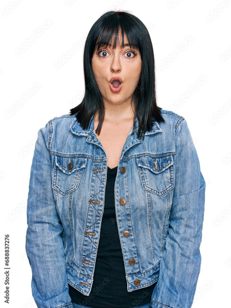 Young hispanic woman wearing casual clothes afraid and shocked with surprise expression, fear and excited face. Young hispanic woman wearing casual clothes afraid and shocked with surprise expression, fear and excited face.