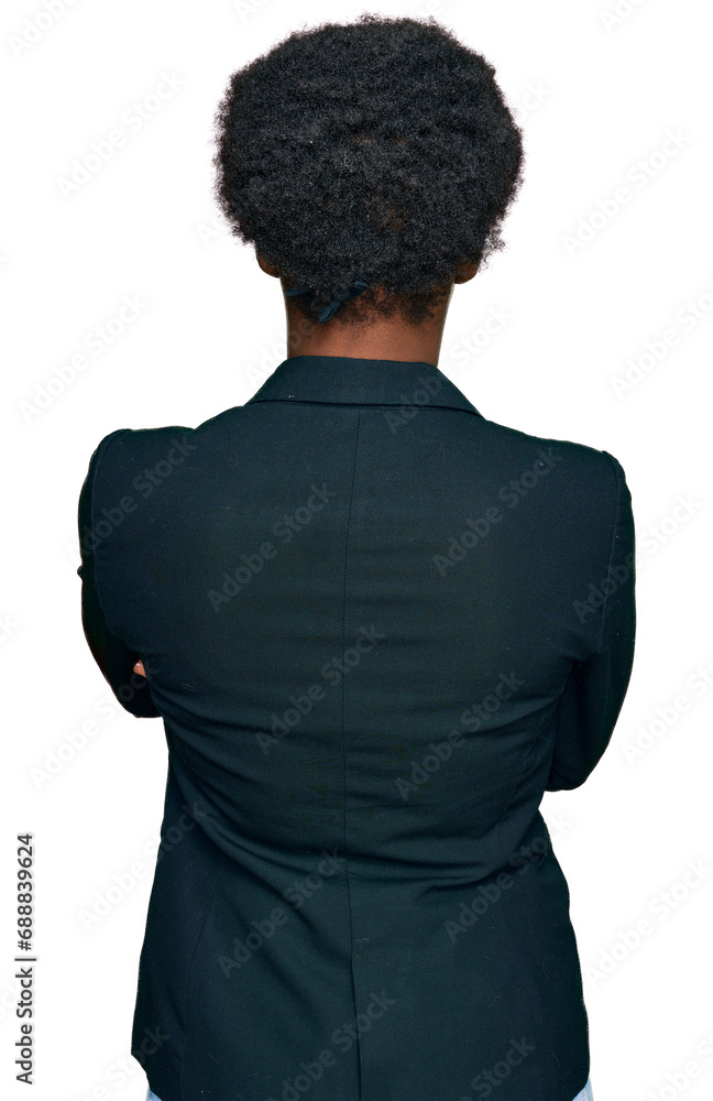 Young african american girl wearing business clothes standing backwards looking away with crossed arms