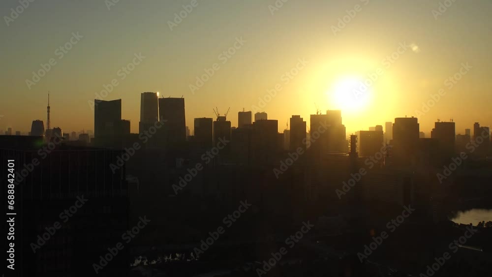 TOKYO, JAPAN - NOV 2023 : Aerial high angle view of cityscape of Tokyo and Mount Fuji in sunset. View of office buildings around Tokyo station and Nagatacho area. 4K time lapse shot, day to night. TOKYO, JAPAN - NOV 2023 : Aerial high angle view of cityscape of Tokyo and Mount Fuji in sunset. View of office buildings around Tokyo station and Nagatacho area. 4K time lapse shot, day to night.