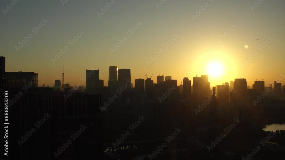 TOKYO, JAPAN - NOV 2023 : Aerial high angle view of cityscape of Tokyo in sunset. View of office buildings around Tokyo station and Nagatacho area. TOKYO, JAPAN - NOV 2023 : Aerial high angle view of cityscape of Tokyo in sunset. View of office buildings around Tokyo station and Nagatacho area.
