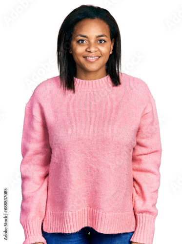 Beautiful hispanic woman wearing casual winter sweater with a happy and cool smile on face. lucky person.