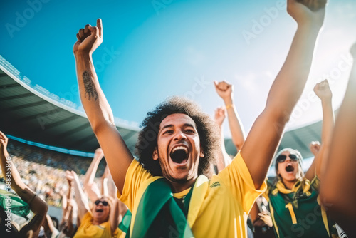 Football fan crowd cheering and supporting favourite soccer team on the stadium. World cup event. Man at soccer match. Final win. © VisualProduction