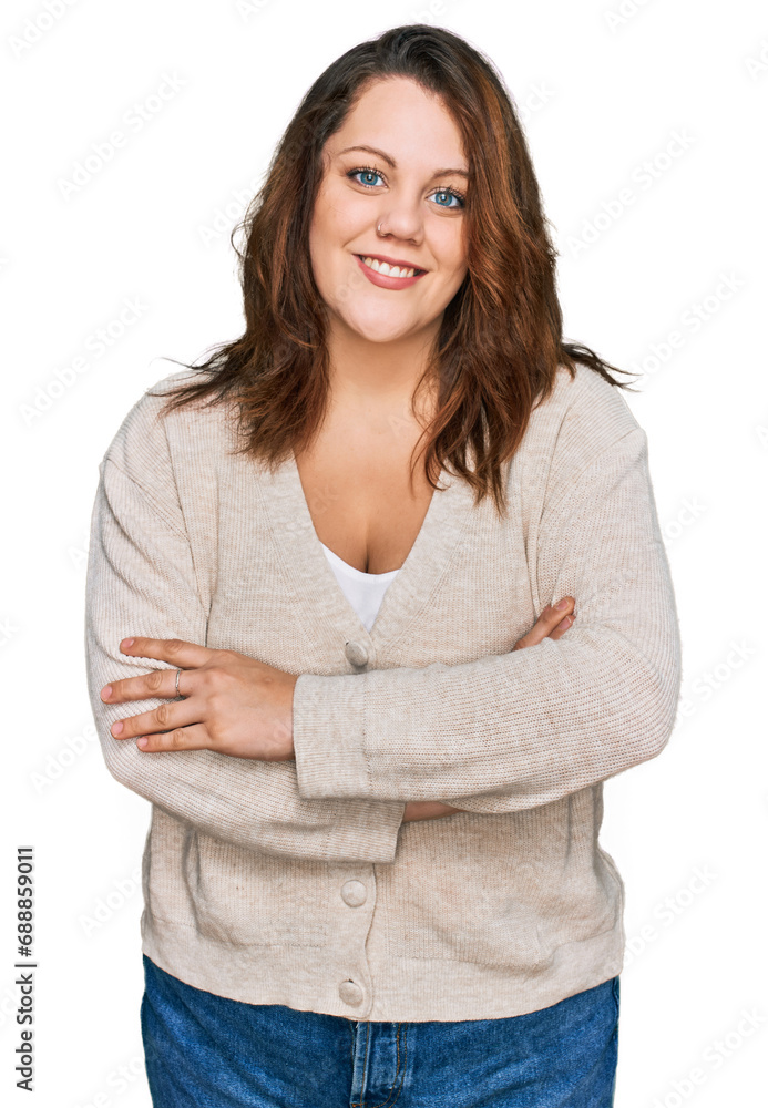 Young plus size woman wearing casual clothes happy face smiling with crossed arms looking at the camera. positive person. Young plus size woman wearing casual clothes happy face smiling with crossed arms looking at the camera. positive person.