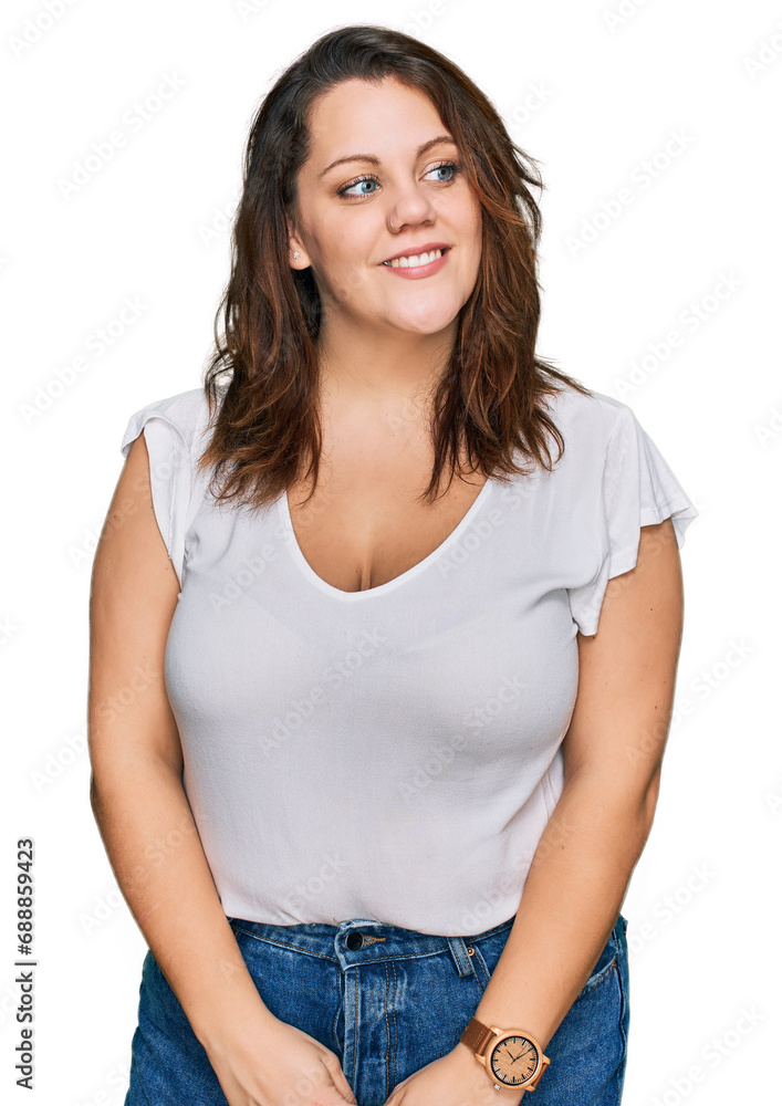 Young plus size woman wearing casual white t shirt smiling looking to the side and staring away thinking. Young plus size woman wearing casual white t shirt smiling looking to the side and staring away thinking.