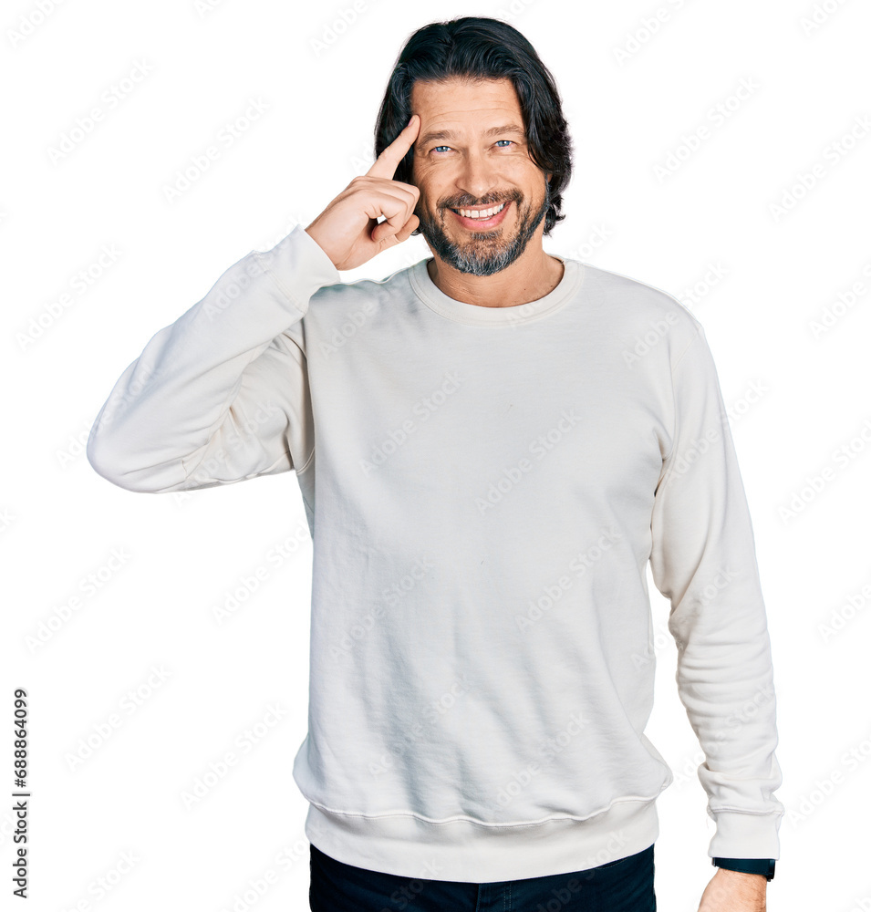 Middle age caucasian man wearing casual clothes smiling pointing to head with one finger, great idea or thought, good memory Middle age caucasian man wearing casual clothes smiling pointing to head with one finger, great idea or thought, good memory
