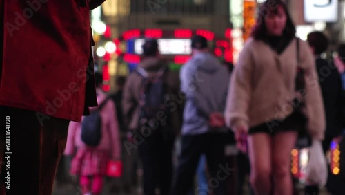 SHINJUKU, TOKYO, JAPAN - NOV 2023 : KABUKICHO downtown area at night. Colorful led neon street signs at entertainment district. Japanese urban city nightlife, bar, club and drinking concept video.