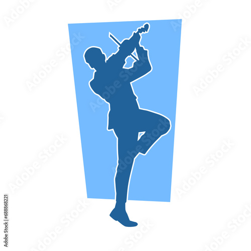 Silhouette of a male musician male playing violin musical instrument. Silhouette of a man violinist in action pose.