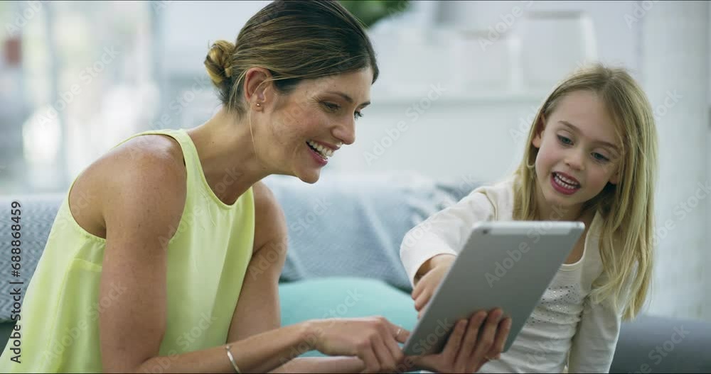 Internet, mother and child with tablet on sofa in home, relax with games, website and smile together. Elearning, digital app and happy woman and girl with social media, love and learning in apartment Internet, mother and child with tablet on sofa in home, relax with games, website and smile together. Elearning, digital app and happy woman and girl with social media, love and learning in apartment
