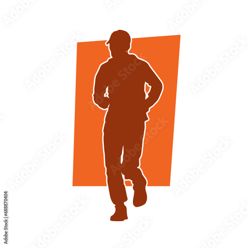 Silhouette of a sporty man doing jogging. Silhouette of a man in pose of healthy running.