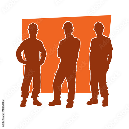 Silhouette of man in construction worker costume. Silhouette of construction worker male in pose. 